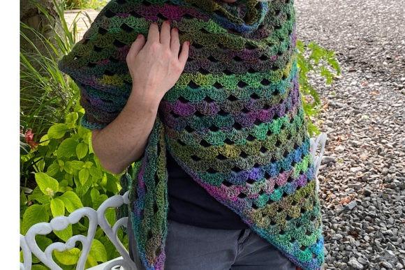 Cascading Shawl Pattern — crochet shawl patterns Crochet shawl in vibrant colors showcasing a cascading design. — crochet shawl patterns