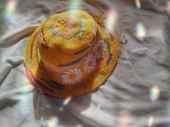 Colorful Crochet Bucket Hat — crochet bucket hat patterns Crochet bucket hat with colorful design and floral embellishments. — crochet bucket hat patterns