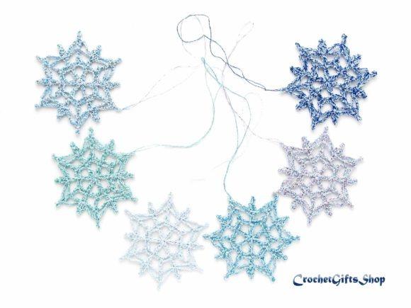 Crochet Snowflake Ornaments — Crochet Christmas Ornaments Patterns Crochet Christmas Ornaments Patterns featuring snowflake designs in blue and white.