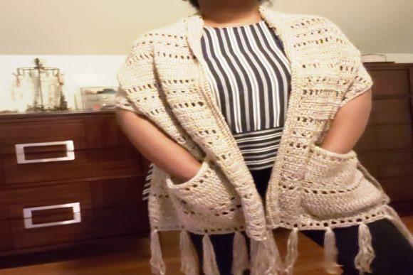 Crochet Pockets Shawl — crochet shawl patterns Crochet Pockets Shawl featuring practical pockets and tassels. — crochet shawl patterns