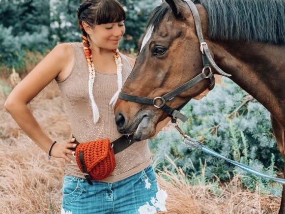 Crochet Crossbody Bag — crochet crossbody bag patterns Crochet crossbody bag worn while interacting with a horse. — crochet crossbody bag patterns