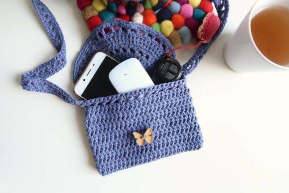 Eyelet Purse — Crochet clutch bag patterns Crochet clutch bag with phone and essentials inside — Crochet clutch bag patterns
