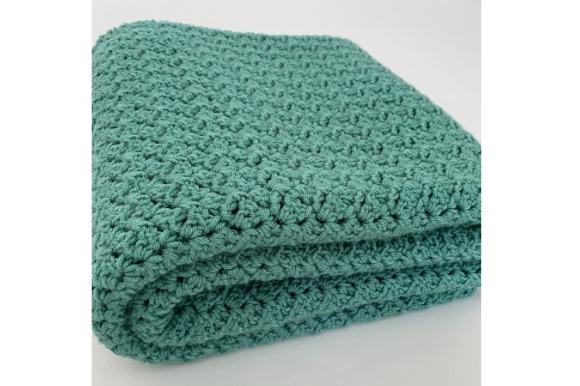French Countryside Blanket — cozy crochet blanket patterns Cozy crochet blanket pattern in textured green yarn — cozy crochet blanket patterns