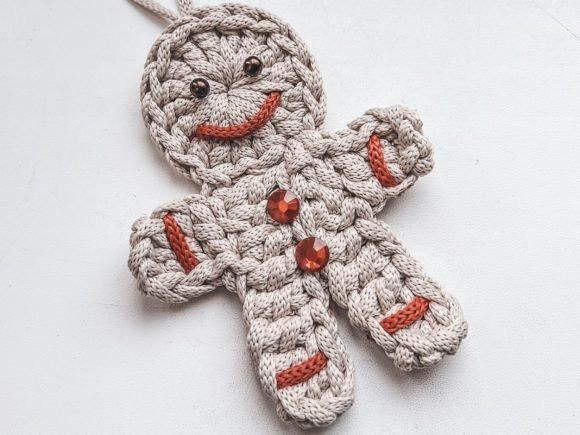 Gingerbread Man Crochet Ornament — Crochet Christmas Ornaments Patterns Gingerbread man crochet ornament with bead details — Crochet Christmas Ornaments Patterns