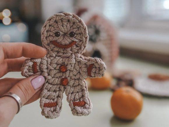 Gingerbread Man Crochet Ornament — Crochet Christmas Ornaments Patterns Gingerbread man crochet ornament with bead details — Crochet Christmas Ornaments Patterns