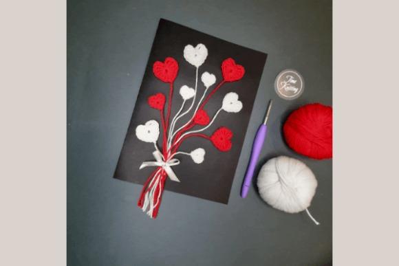Valentine Card Crochet Pattern — Valentine crochet patterns Valentine crochet patterns featuring a heart card design with yarn and crochet hook.