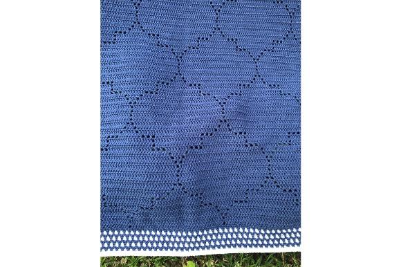 Moroccan Impressions Afghan — cozy crochet blanket patterns Cozy crochet blanket patterns featuring a blue Moroccan Impressions afghan with a geometric design