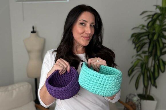 Crocheted Nesting Bowls — crochet basket patterns Woman holding two crocheted nesting bowls in purple and turquoise — crochet basket patterns