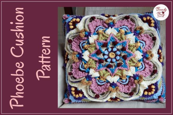 Phoebe Cushion Square Pattern — crochet pillow patterns Crochet pillow featuring floral mandala design in vibrant colors. — crochet pillow patterns