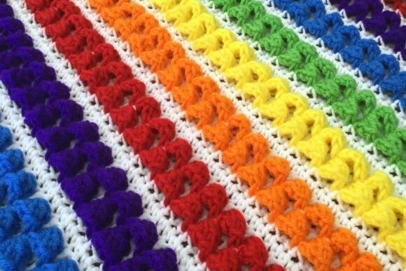 Rainbow Baby Blanket Crochet Pattern — cozy crochet blanket patterns Colorful crochet blanket with seven accent colors in a rainbow pattern. — cozy crochet blanket patterns