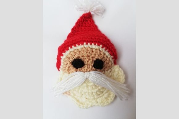 Santa Face Ornament — Crochet Christmas Ornaments Patterns Crochet Santa face ornament for Christmas decorations — Crochet Christmas Ornaments Patterns
