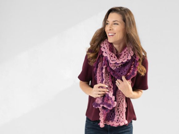 Scroll Lace Scarf Crochet Pattern — Crochet Scarf Patterns Crochet scarf in shades of purple worn by a woman — Crochet Scarf Patterns