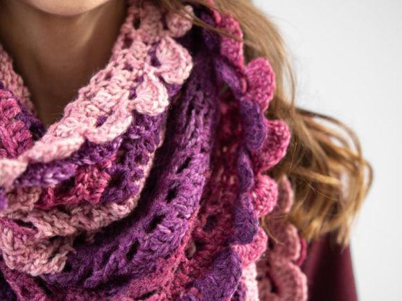 Scroll Lace Scarf — Crochet Scarf Patterns Crochet scarf showcasing a mirrored lace design in pink and purple hues. — Crochet Scarf Patterns