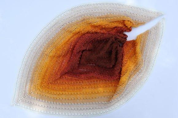 Textured Crochet Shawl — crochet shawl patterns Crochet shawl in warm gradient colors of orange, brown, and cream. — crochet shawl patterns