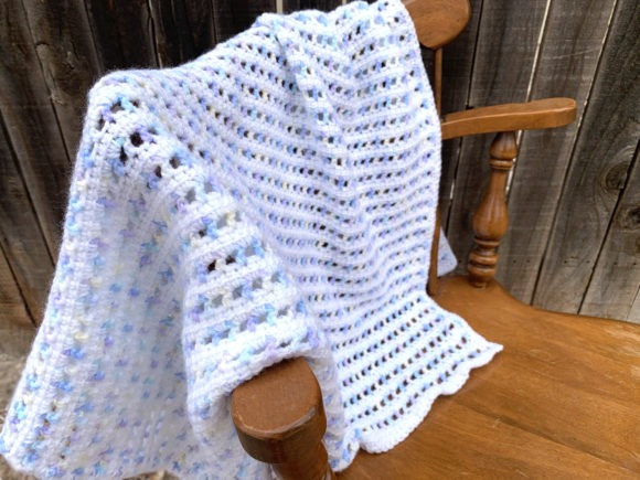Sherbet Baby Blanket Crochet Pattern — cozy crochet blanket patterns Cozy crochet blanket pattern in light blue and white on a wooden chair. — cozy crochet blanket patterns