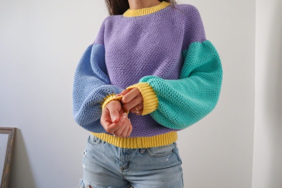 Colorful Crochet Sweater — crochet sweater patterns Crochet sweater with balloon sleeves in purple, teal, and yellow. — crochet sweater patterns