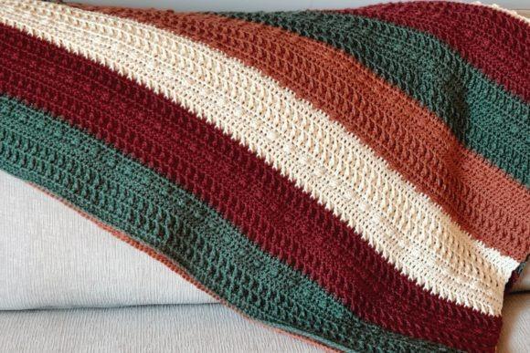 Jaske Throw Blanket — cozy crochet blanket patterns Cozy crochet blanket with textured stripes in earthy colors — cozy crochet blanket patterns