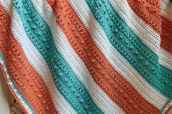 Sara Bead Baby Blanket — cozy crochet blanket patterns Cozy crochet blanket patterns featuring a lighter textured baby blanket.