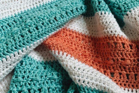 Sara Bead Baby Blanket — cozy crochet blanket patterns Cozy crochet blanket patterns featuring airy texture and modern design.