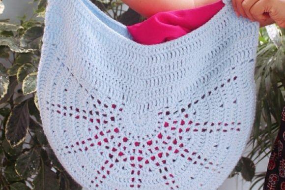 Sunshine Tote Bag — crochet tote bags patterns Crochet tote bag with a sunburst design in light blue. — crochet tote bags patterns
