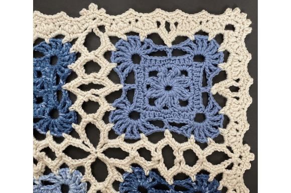 Vintage Lace Crochet Blanket — cozy crochet blanket patterns Vintage Lace crochet blanket pattern with blue and cream motifs — cozy crochet blanket patterns