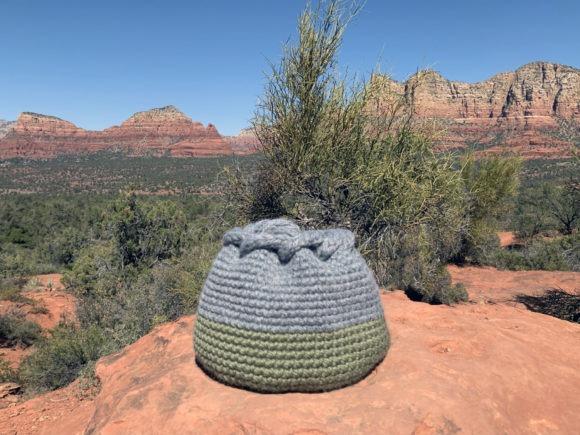 Vista Woven Basket — crochet basket patterns Crochet basket in gray and green on a rocky landscape — crochet basket patterns