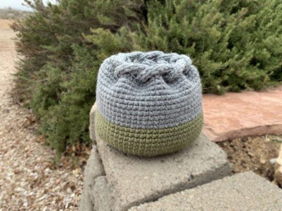 Vista Woven Basket Pattern — crochet basket patterns Crochet basket with braided rim in gray and green yarn. — crochet basket patterns