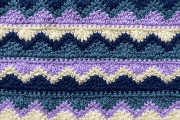 Mosaic Crochet Blanket Pattern — mosaic crochet blanket patterns Mosaic crochet blanket pattern with bold colorwork in blue, purple, and cream. — mosaic crochet blanket patterns