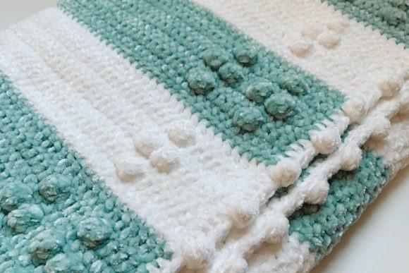 Diamond Velvet Baby Blanket — Crochet Baby Blanket Patterns Crochet baby blanket featuring diamond-inspired texture in soft teal and white colors. — Crochet Baby Blanket Patterns