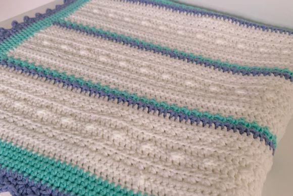 Fairy Skies Baby Blanket — Crochet Baby Blanket Patterns Crochet Baby Blanket Patterns featuring textured design in soft colors.