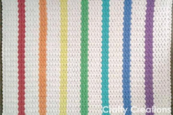 Rainbow Baby Blanket Pattern — Crochet Baby Blanket Patterns Crochet Baby Blanket Patterns featuring a rainbow design with shell stitches.