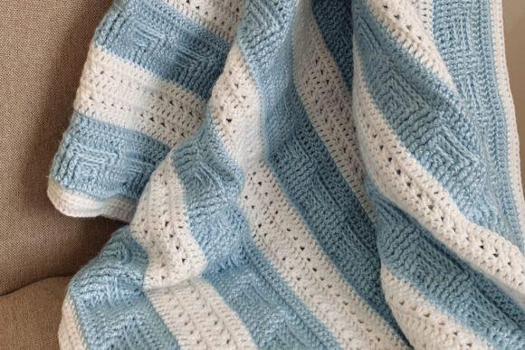 Sail Away Baby Blanket — Crochet Baby Blanket Patterns Crochet Baby Blanket Patterns featuring a textured design in blue and white stripes.