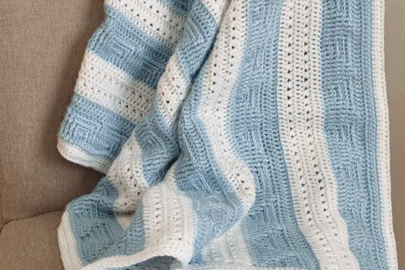 Sail Away Baby Blanket — Crochet Baby Blanket Patterns Crochet Baby Blanket Patterns featuring a textured design in blue and white.