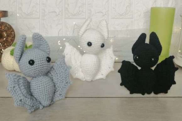 Bat Amigurumi Patterns — Halloween amigurumi patterns Halloween amigurumi patterns featuring three bat toys in gray, white, and black.