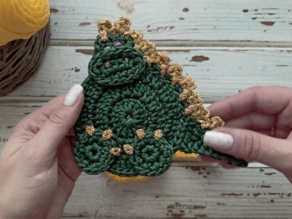 Dragon Coaster Crochet — things to crochet for creative handmade Dragon-shaped crochet coaster in green and gold yarn. — things to crochet for creative handmade