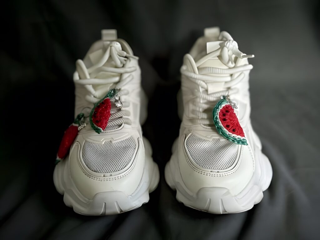 Small Crochet Projects: Watermelon Shoe Charm on white sneakers