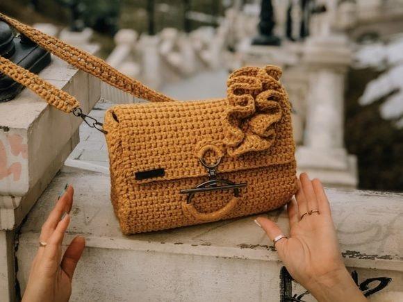 Crochet Bag with Ruffles — crochet bag patterns Crochet bag with ruffles in mustard color, showcasing textured design. — crochet bag patterns
