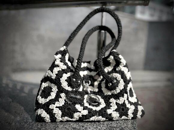 Crochet Bag Patterns Crochet bag featuring hexagon motifs in black and white. — crochet bag patterns