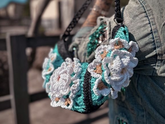 Crochet Bag Patterns Crochet bag featuring granny square design and floral embellishments. — crochet bag patterns