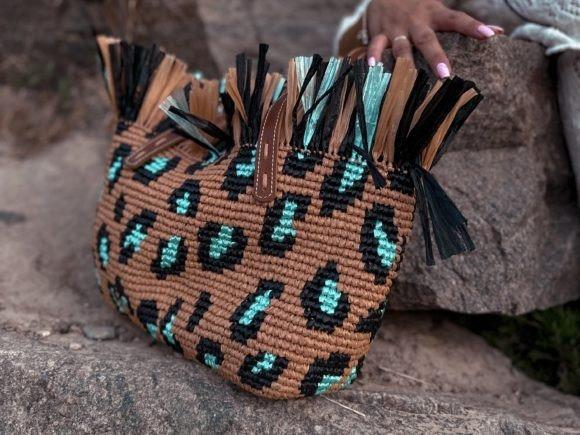 Crochet Bag Leopard Pattern — crochet bag patterns Crochet bag featuring a leopard pattern with fringe details. — crochet bag patterns