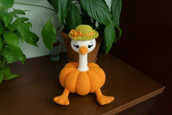 Pumpkin Goose Amigurumi — Halloween amigurumi patterns Pumpkin Goose amigurumi with a green hat and orange body — Halloween amigurumi patterns