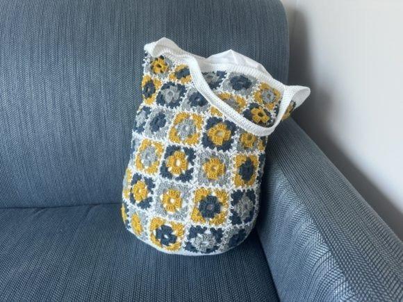 Vintage Vibes Market Tote — crochet bag patterns Crochet bag featuring a vintage design with colorful floral patterns. — crochet bag patterns