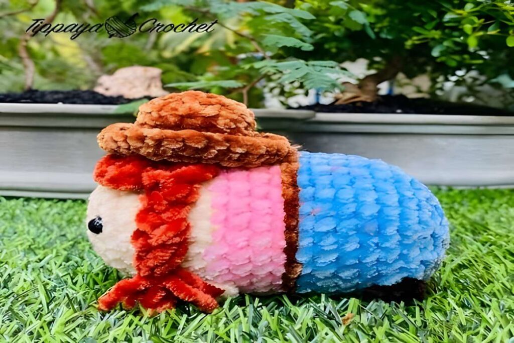 Amigurumi crochet pattern of a farm animal with a hat and colorful body. — amigurumi crochet patterns