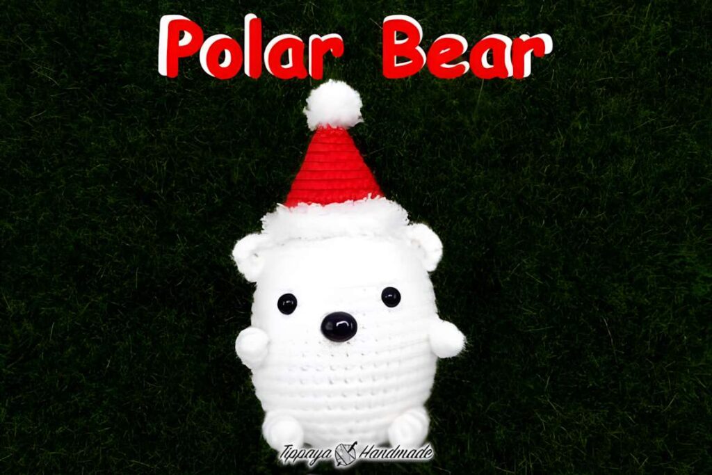 Christmas Amigurumi Polar Bear wearing a Santa hat, perfect for holiday crafts. — amigurumi crochet patterns