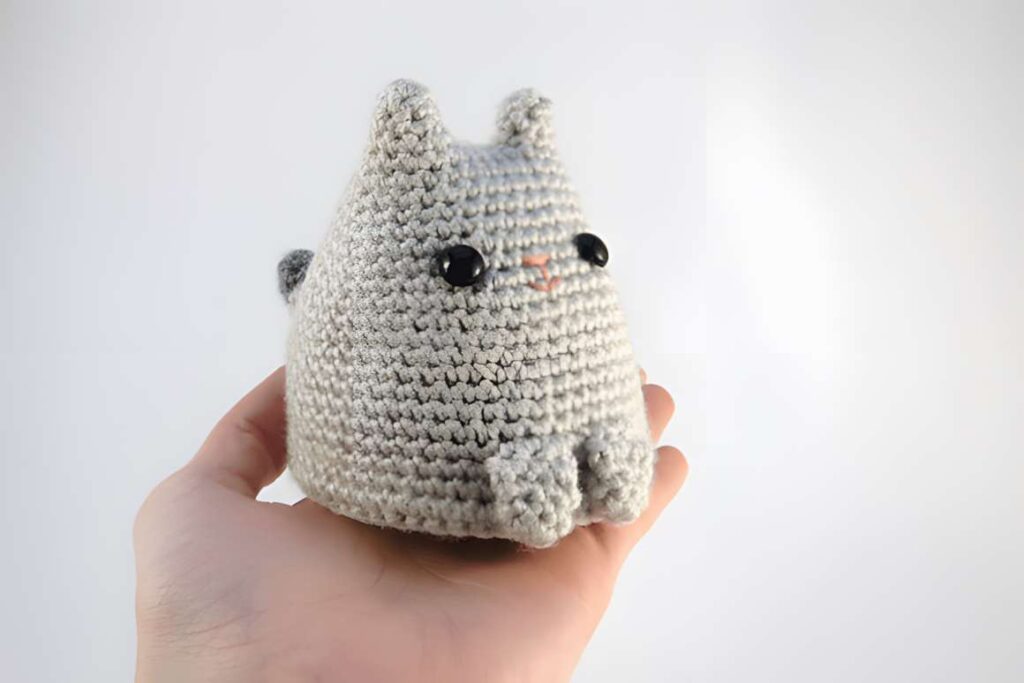 Cute Cat Amigurumi Crochet Patterns featuring a gray cat plush toy.