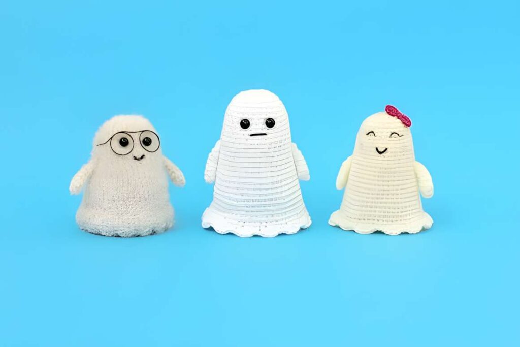 Amigurumi crochet patterns featuring cute ghost characters for Halloween.