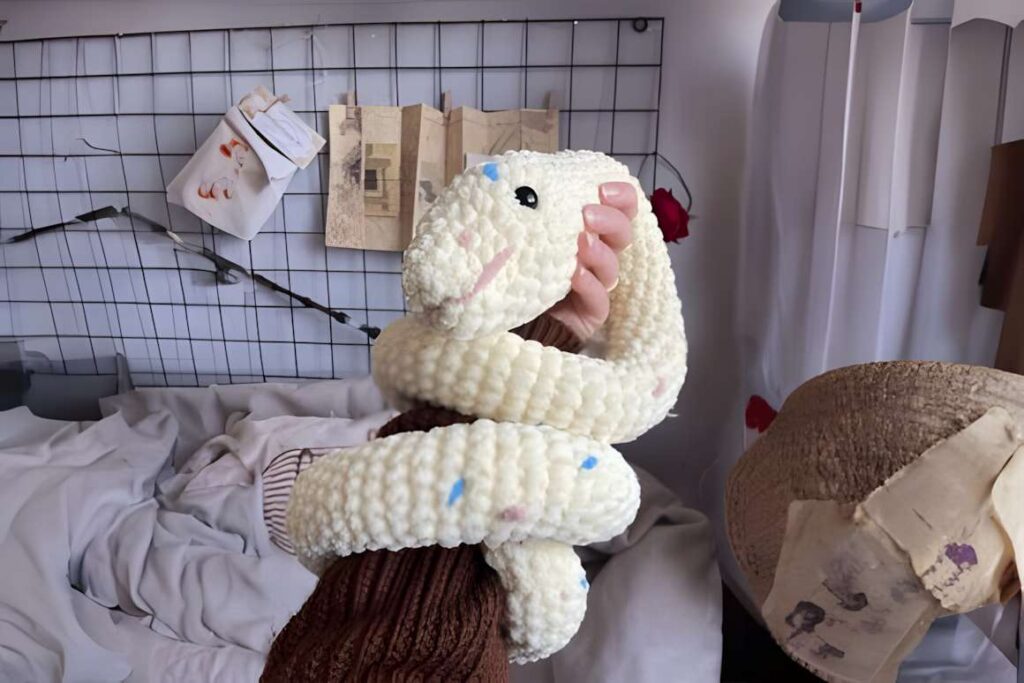 Cute snake crochet pattern showcasing a soft, textured design, perfect for amigurumi crochet patterns.