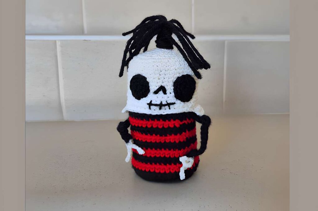 Amigurumi crochet patterns featuring Halloween skeleton nesting dolls.