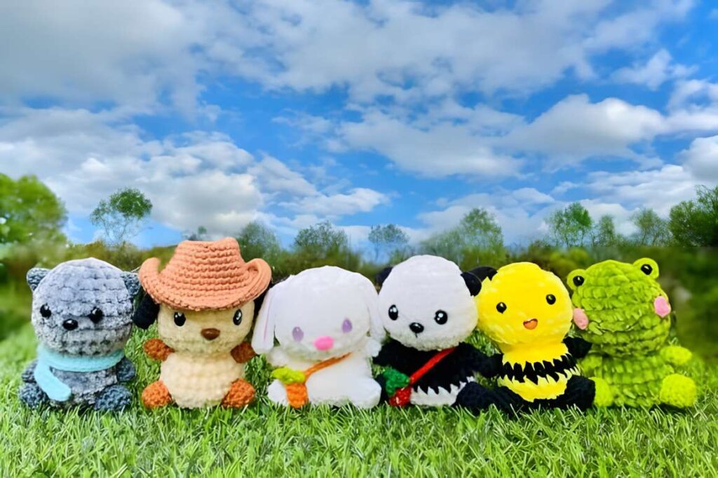 Chunky chenille yarn amigurumi crochet patterns featuring little animals like a panda, dog, and frog.