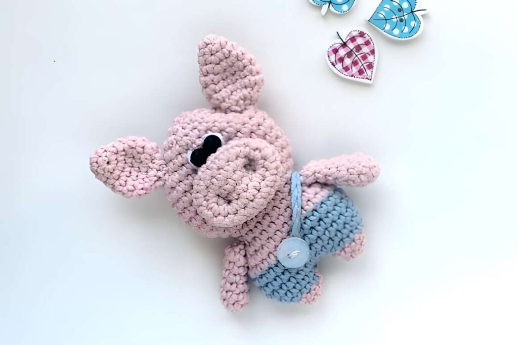Amigurumi crochet patterns featuring a cute pig character.